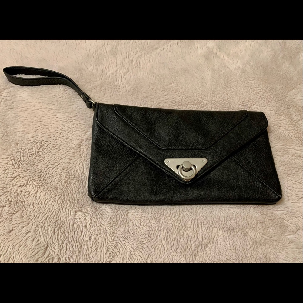 Woman’s faux leather clutch